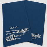 Set of 2 navy linen tea towels with white Fjære coastal design. Hand printed in Derbyshire. Absorbent, quick drying and made for everyday use.