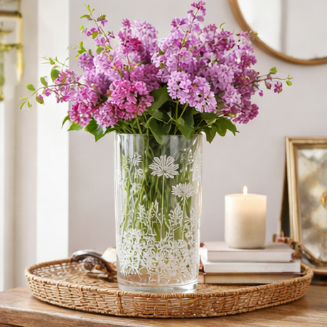 floral arrangement in glass vases floral etched with design.