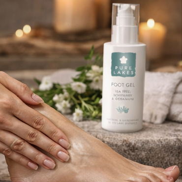 Foot gel with packaging and 'Pure Lakes' branding foot care product with usage on feet.