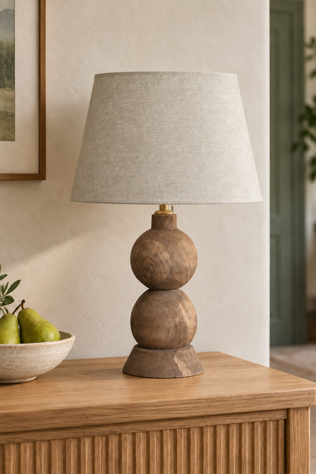 Tapered beige linen shade on the Frampton Medium wooden table lamp