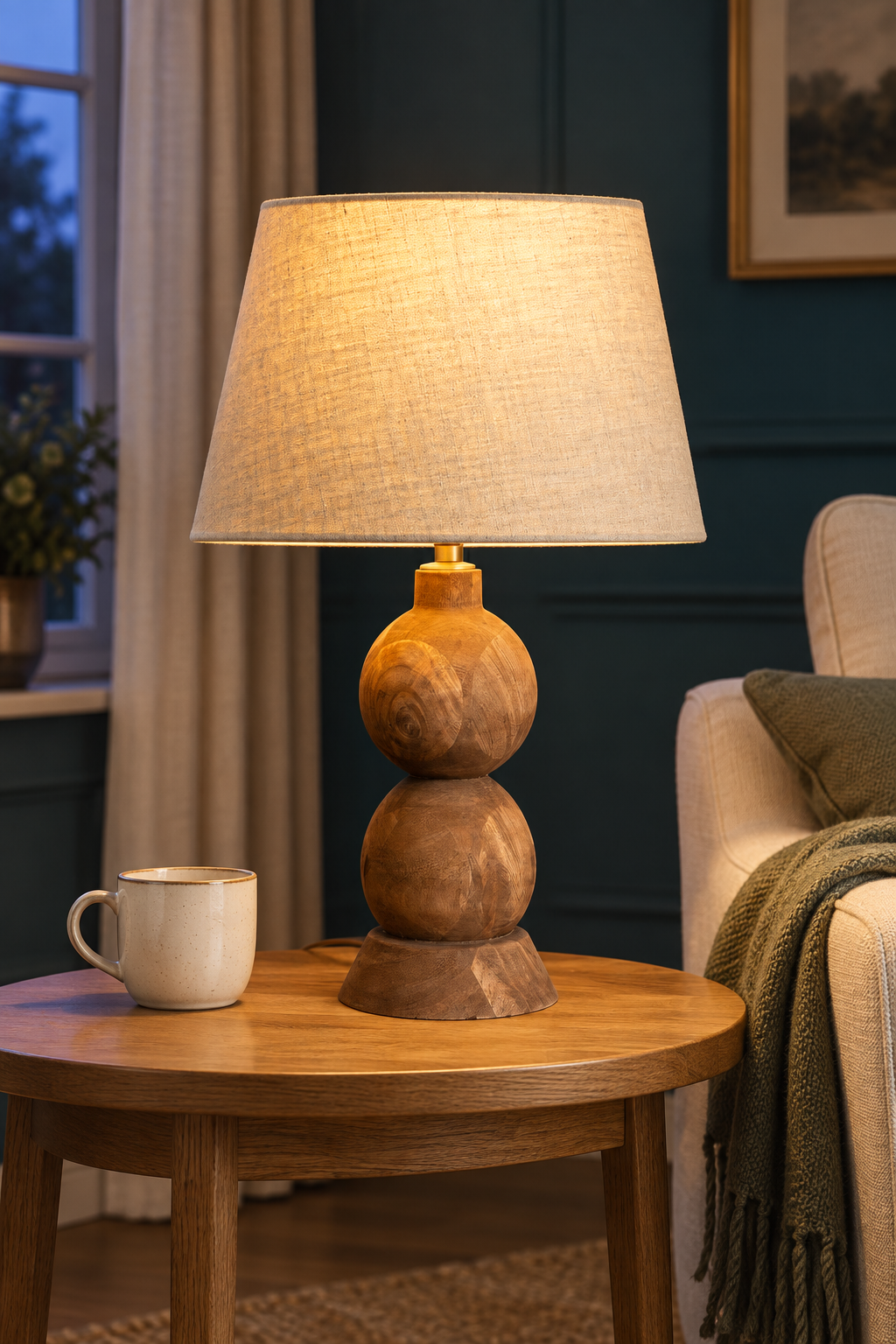 Smooth farmhouse brown finish and visible grain on the hand-carved Frampton lamp base