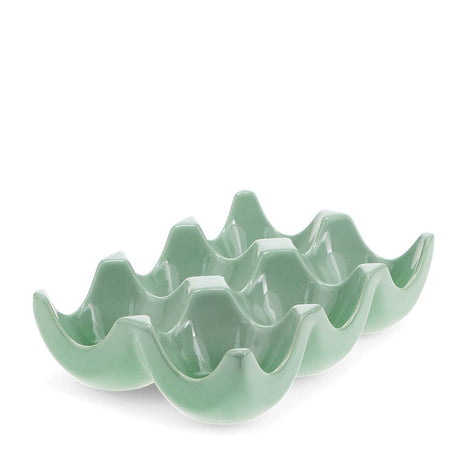 Green ceramic six egg holder on a white background