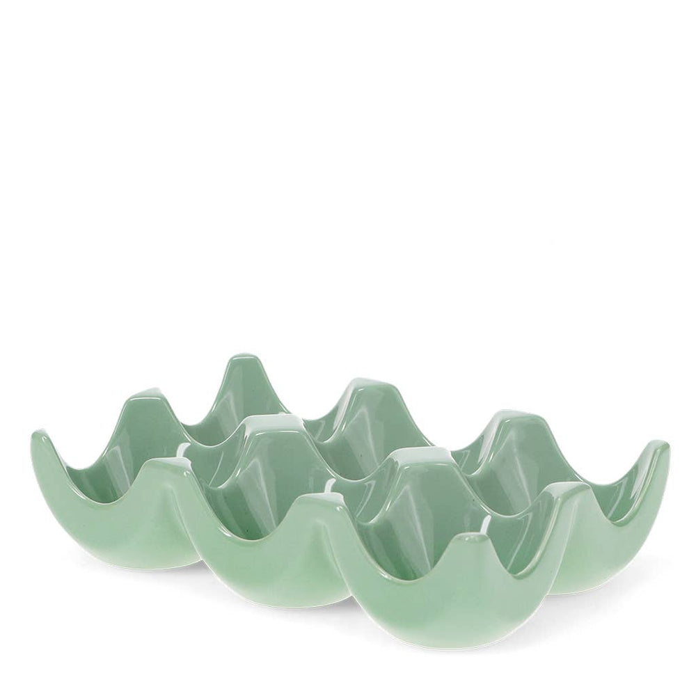Green ceramic six egg holder on a white background