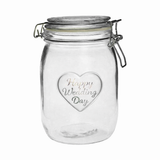 Clear glass jar with 'Happy Wedding Day' engraving on a white background