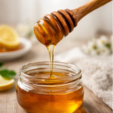 Collage of wooden honey dipper in various settings with honey.