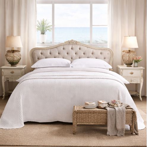  bedroom with a bed, nightstands, and decor.
