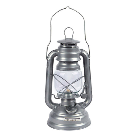 Silver lantern with clear glass on a white background