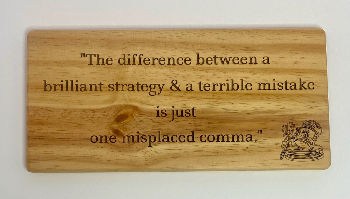 The difference between a brilliant strategy &amp; a terrible mistake is just one misplaced comma - Wooden Sign