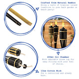 Bamboo torches with oil chamber and cotton wick, suitable for tropical island or beach party decor.