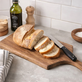wooden cutting boards on a kitchen counter.