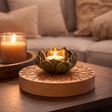 Lotus flower candle holder on carved wooden base