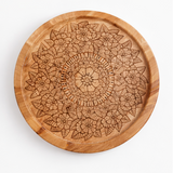 Wooden table with intricate patterns and black hairpin legs, shown from different angles.