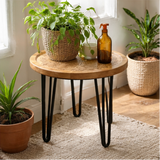Round wooden table with black hairpin legs in various home decor settings.