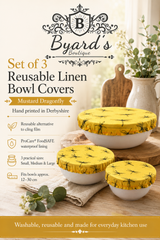 A set of three reusable Mustard Dragonfly linen bowl covers, hand printed in Derbyshire with a black dragonfly design. Lined with ProCare® FoodSAFE waterproof fabric, they are ideal for covering leftovers, salads, fruit bowls, prep bowls and rising dough while reducing the need for cling film.