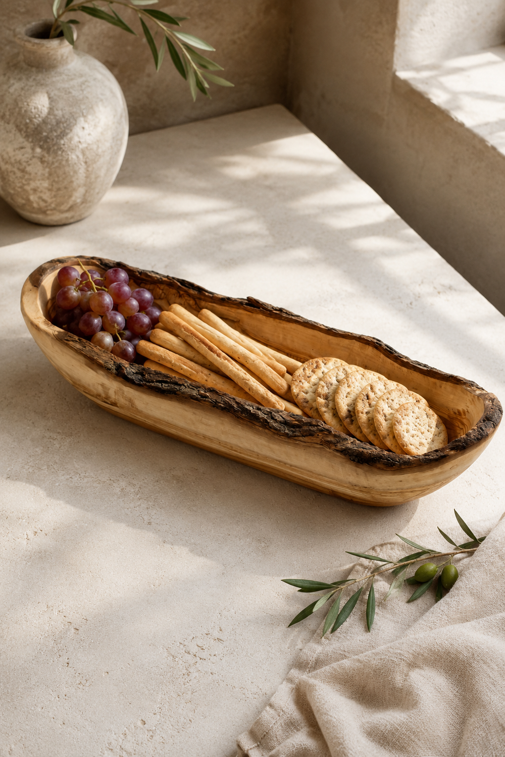 Natural olive wood bread bowl measuring approximately 35 to 39cm