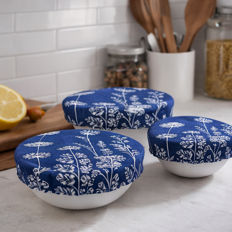 blue patterned lids on white bowls in various settings.