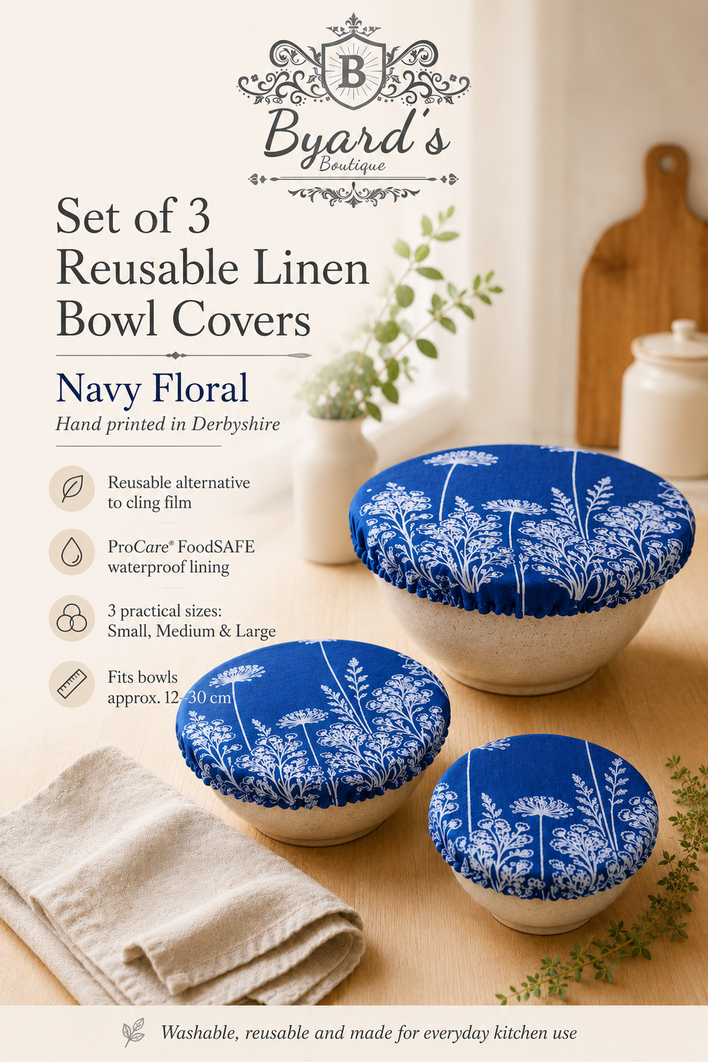 A set of three reusable Navy Florilegium linen bowl covers, hand printed in Derbyshire with a delicate white botanical design featuring agapanthus and foxglove flowers. Lined with ProCare® FoodSAFE waterproof fabric, covering leftovers, salads, fruit bowls, prep bowls and rising dough.