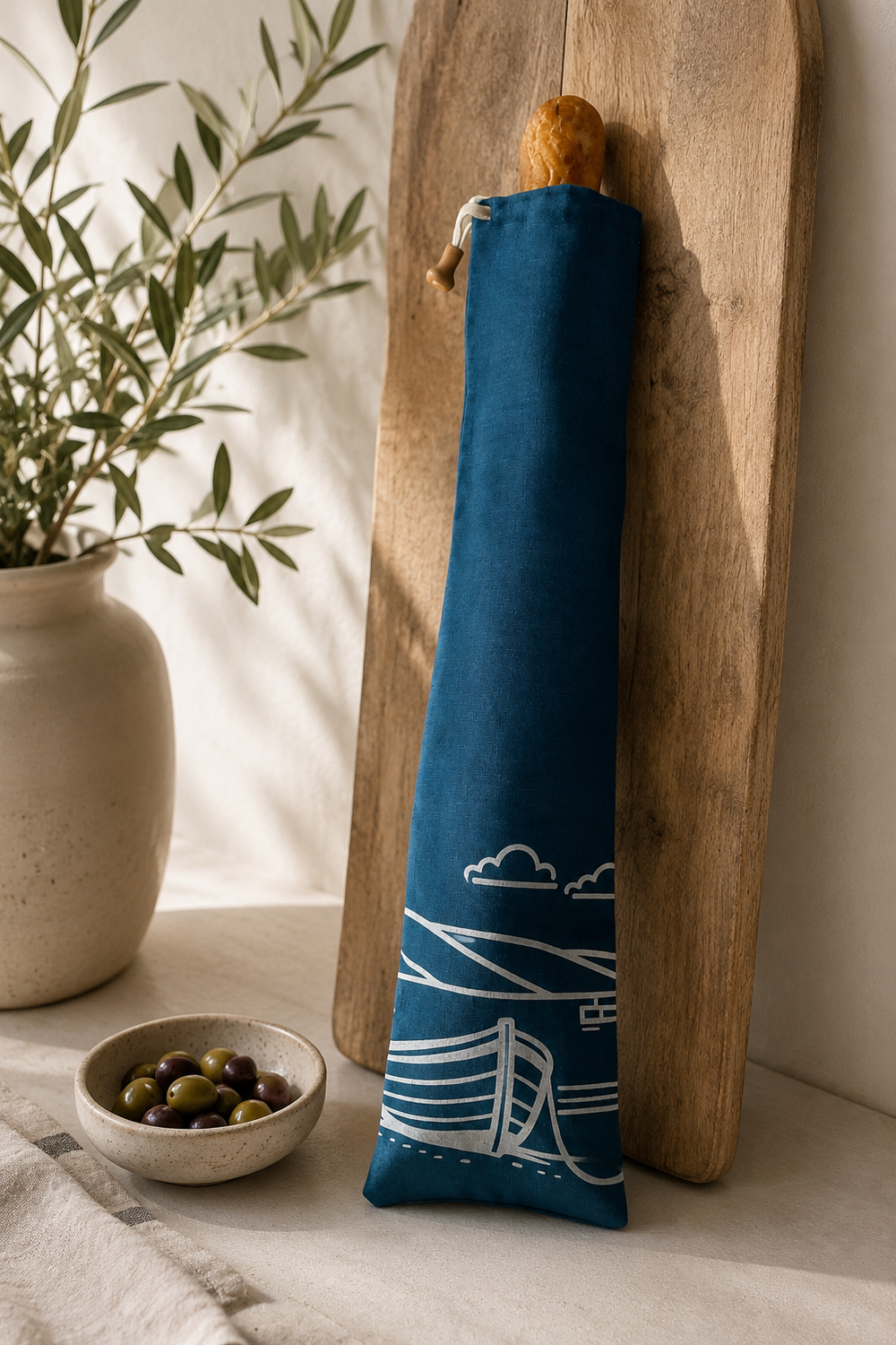 Navy linen baguette bag with white Fjære coastal print, hand printed in Derbyshire for storing French sticks and artisan baguettes.
