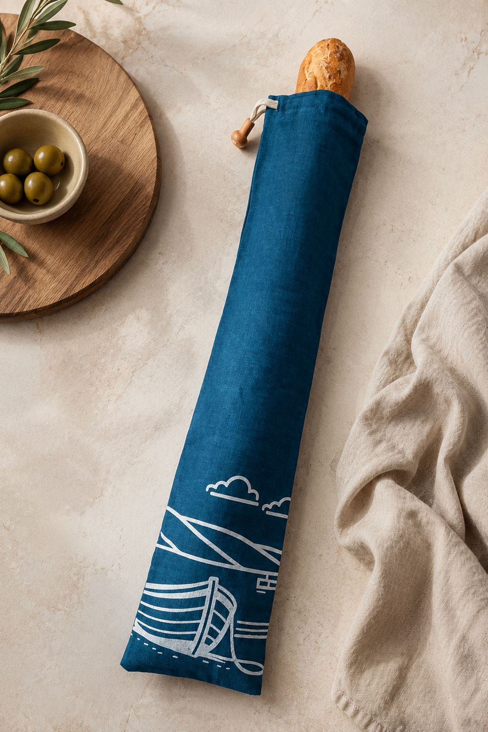 Navy linen baguette bag with white Fjære coastal print, hand printed in Derbyshire for storing French sticks and artisan baguettes.