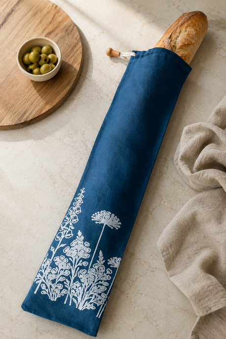 Navy linen baguette bag with white Florilegium floral print, hand printed in Derbyshire for storing French sticks and artisan baguettes.