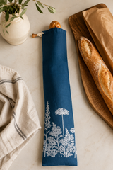 Navy linen baguette bag with white Florilegium floral print, hand printed in Derbyshire for storing French sticks and artisan baguettes.