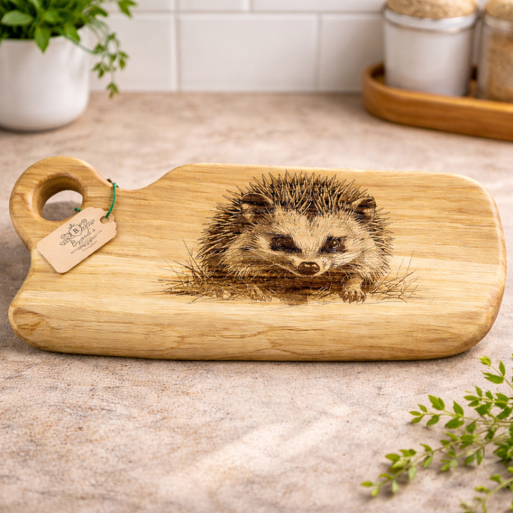 Wooden cutting board with a hedgehog design on a kitchen counter.
