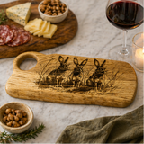 Oak charcuterie board with rabbit design on a table setting with food.