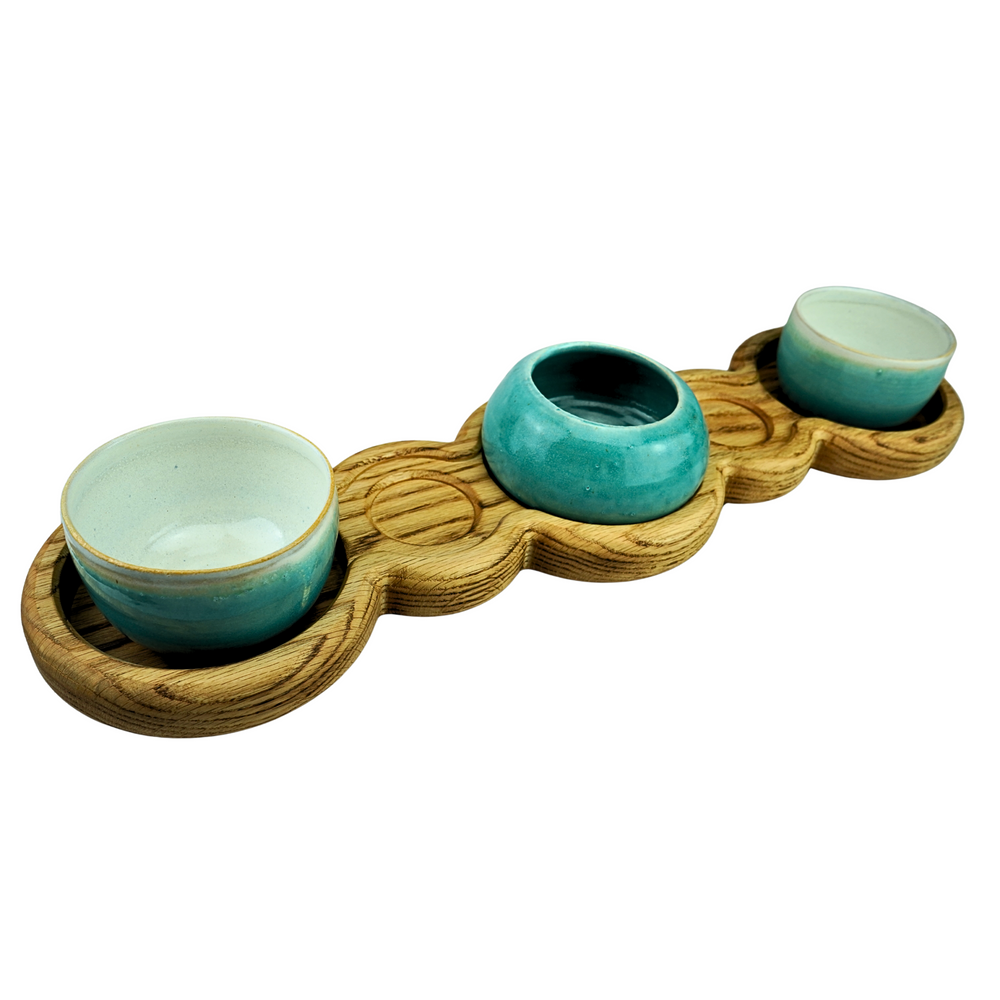 Oak grazing board with three recessed stoneware serving bowls