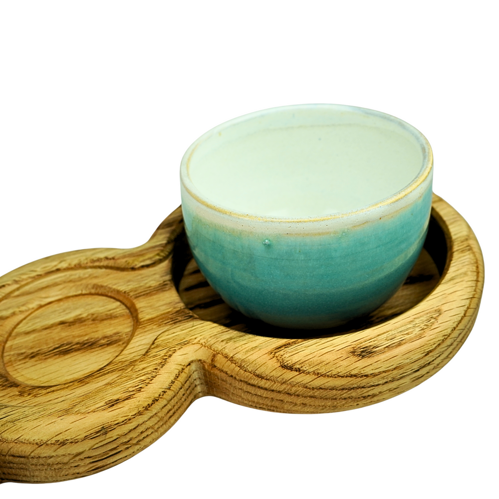 Oak table centrepiece serving board with three stoneware bowls