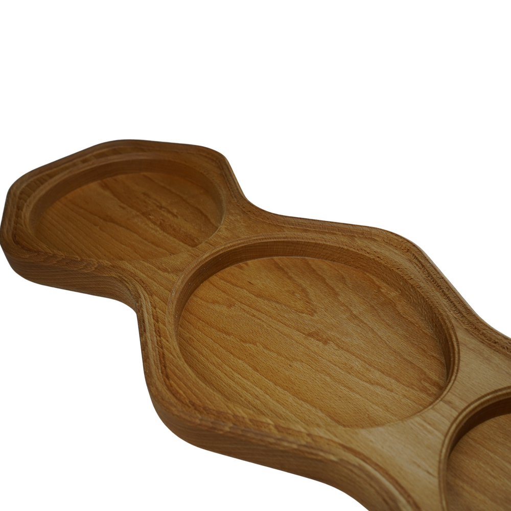 One-of-a-kind oak four-compartment serving board made in Derbyshire