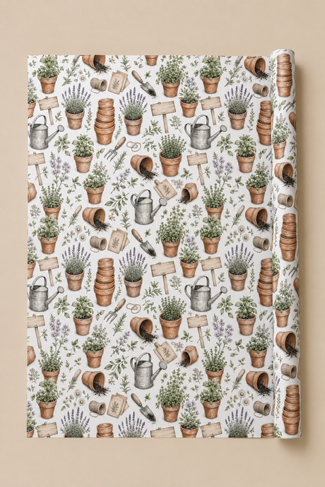 A roll of Personalised Terracotta Pot  wrapping paper featuring a repeating botanical and gardening pattern with potted plants, watering cans, trowels, wooden signs, and lavender sprigs on a white background, shown against a warm beige backdrop.