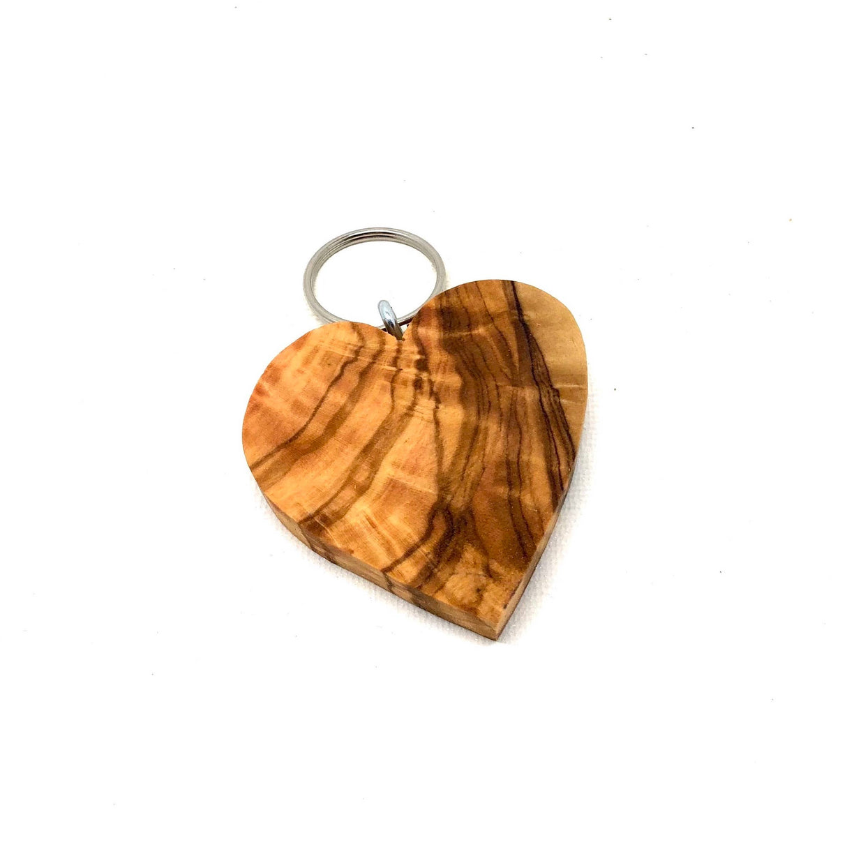 Wooden heart-shaped keychain on a white background