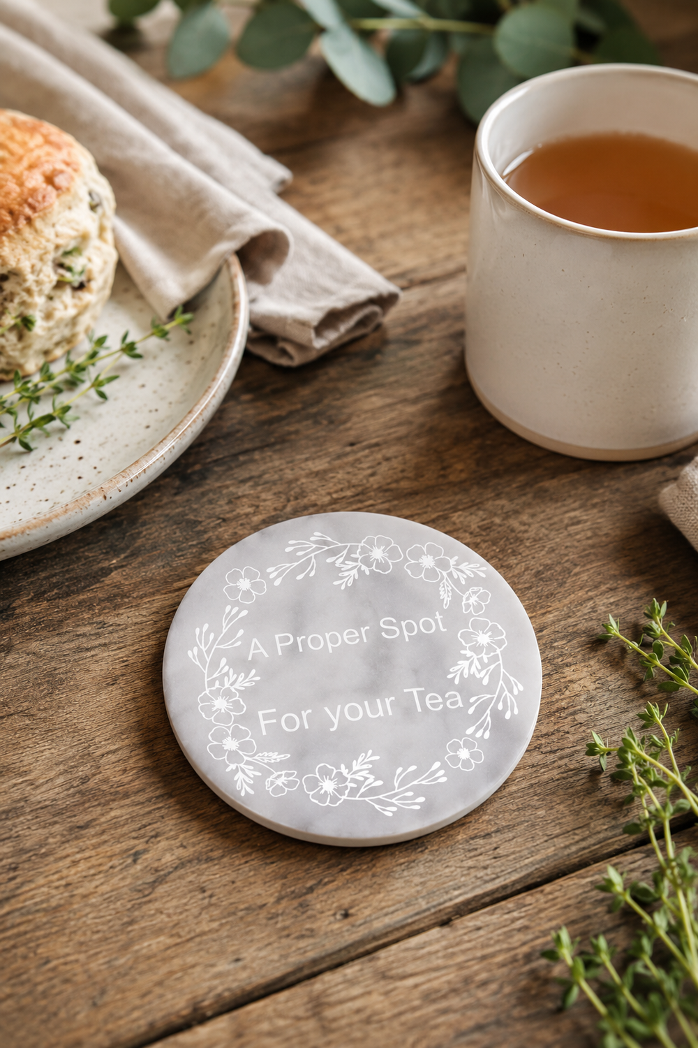 Personalised Round Marble Drinks Coaster – Engraved wood surface.