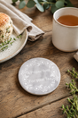 Personalised Round Marble Drinks Coaster – Engraved wood surface.