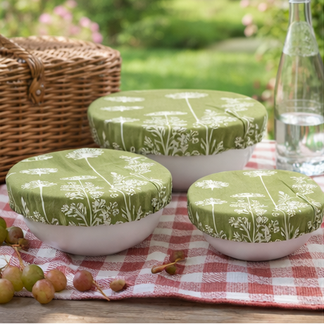 Collage of green patterned bowls with lids used in various settings.