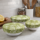 Collage of green patterned bowls with lids used in various settings.