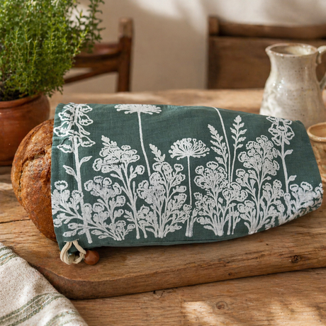Linen bread bag with a floral design on sage green fabric