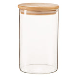 Clear glass jar with a wooden lid on a white background