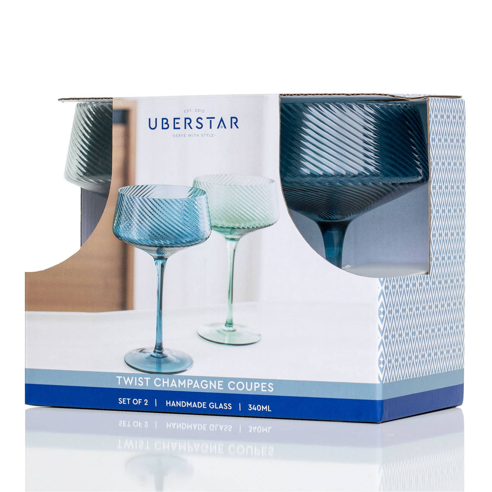 Set of two blue and green striped champagne coupes in Uberstar packaging.
