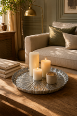 Silver-coloured metal lily leaf tray with embossed radiating leaf pattern and scalloped edge