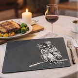 Slate placemats with owl design on  a table, 