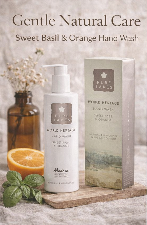 Pure Lakes Sweet Basil & Orange Hand Wash with packaging on a wooden surface.