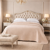 bedroom scenes with beige bedding and neutral decor.