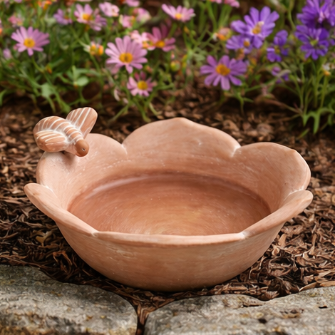 terracotta bowl for bird feeding with bee detail