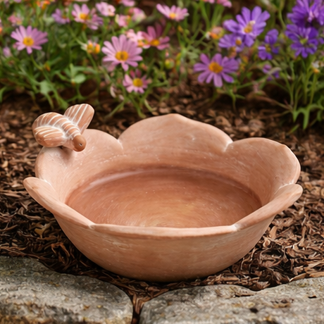 terracotta bowl for bird feeding with bee detail