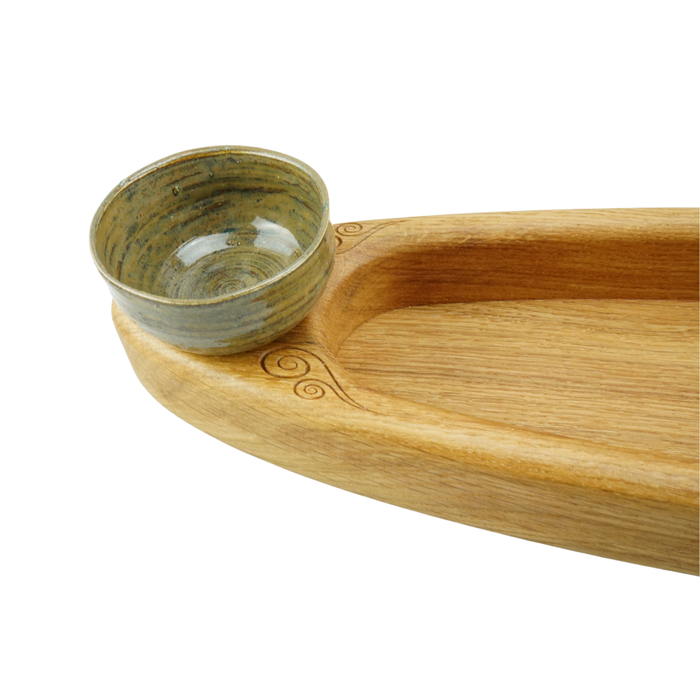 Wooden tray with a ceramic bowl on a white background. The Loom Tray oak serving tray with two stoneware pots
