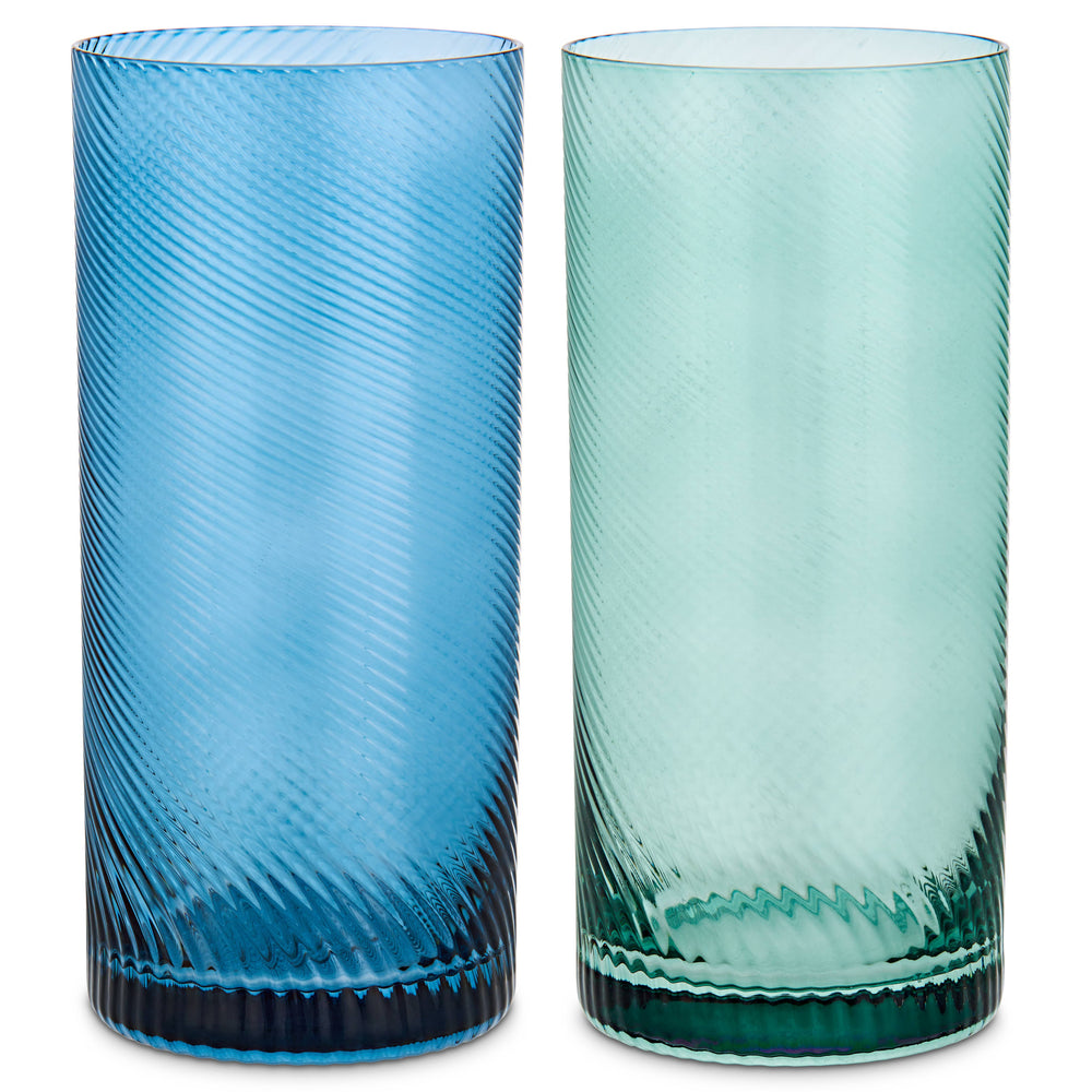 Two blue glass tumblers with textured design on a white background