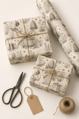 Vintage beekeeping wrapping paper with monochrome artwork and subtle colour accents.
