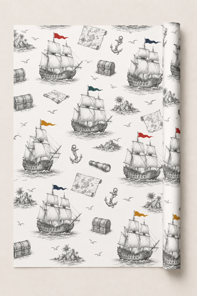 Vintage pirate ship gift wrap with monochrome sailing ship illustration and coloured flag details.