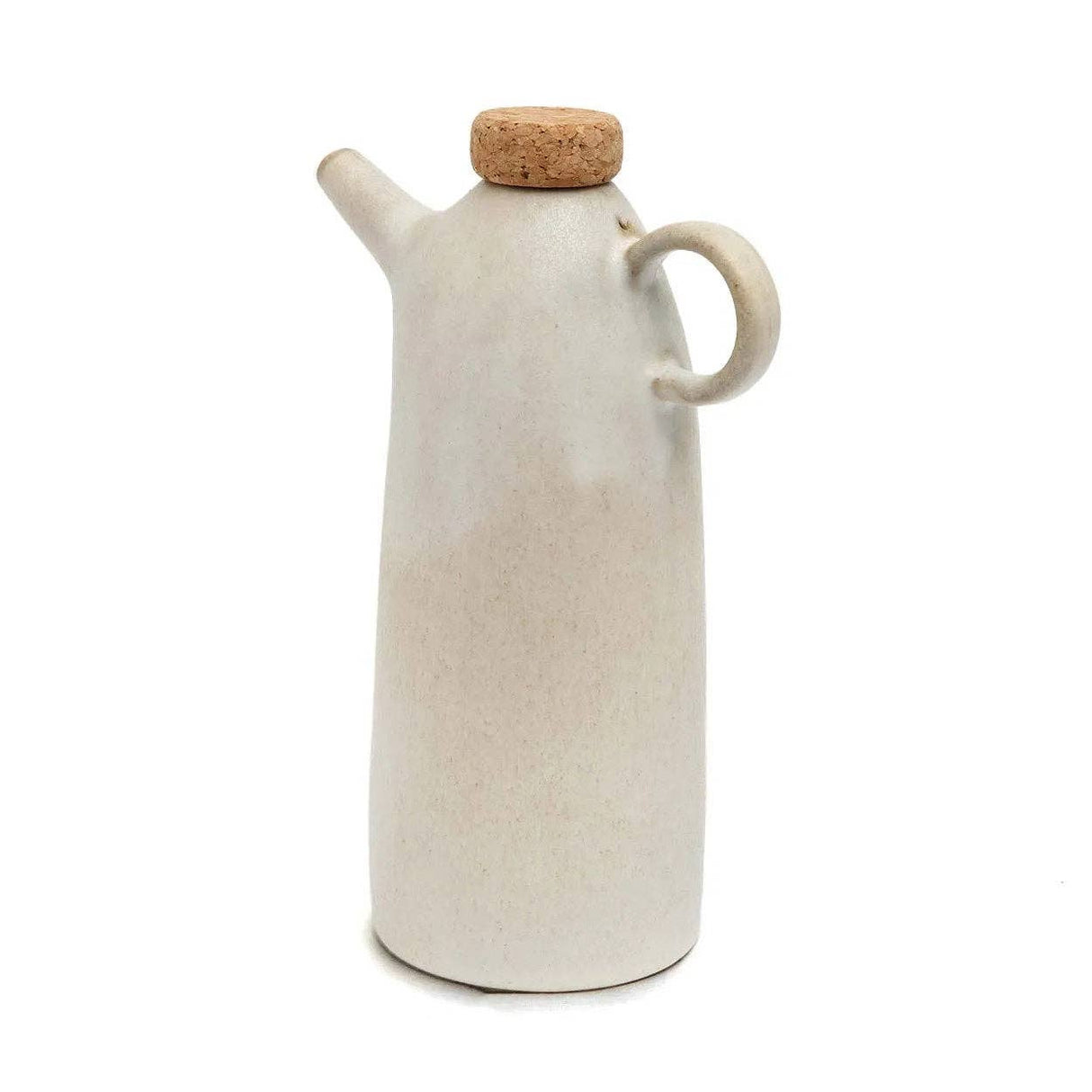 White ceramic oil dispenser with cork lid on a white background